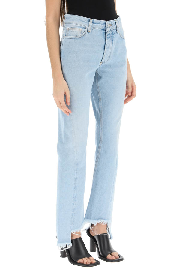 Off-white slim-fit jeans with twisted seams